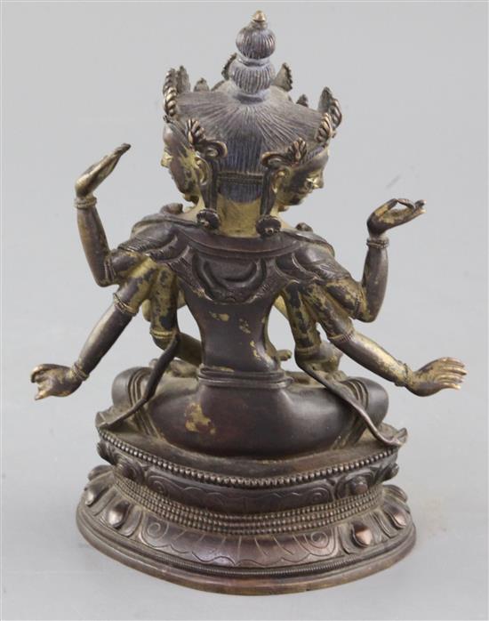 A Sino-Tibetan parcel gilt bronze seated figure of Avalokiteshvara, 18cm